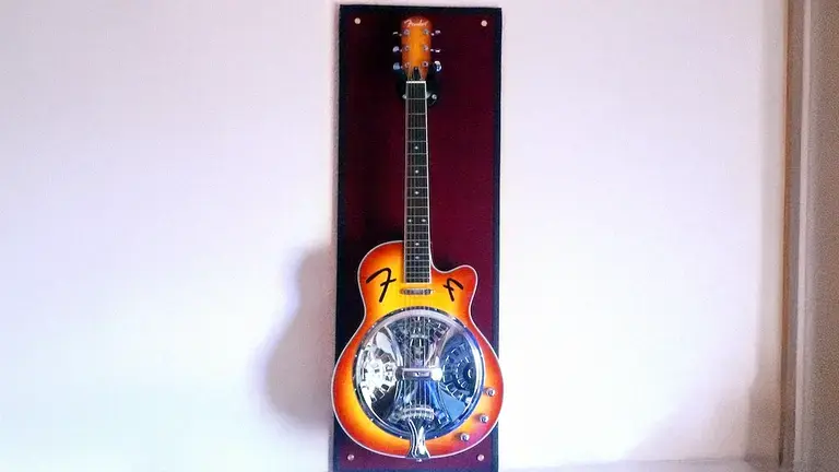 Resnoator guitar on a wall