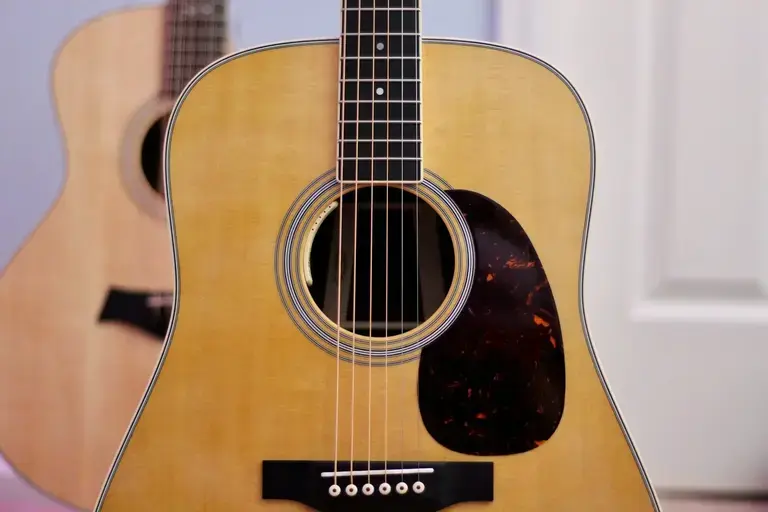 Image a natural finish acoustic guitar