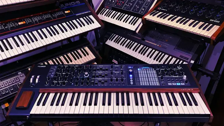 Image a room full of synthesizers