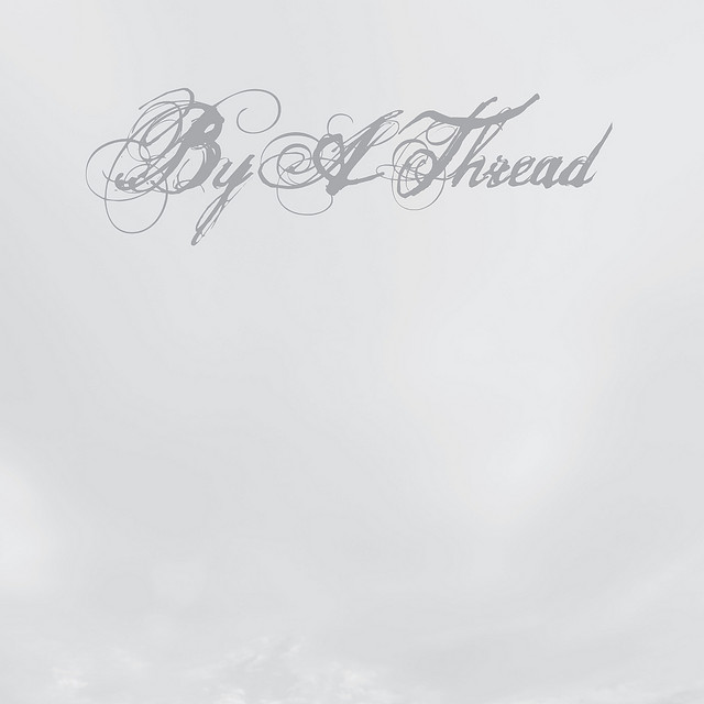 By A Thread album cover