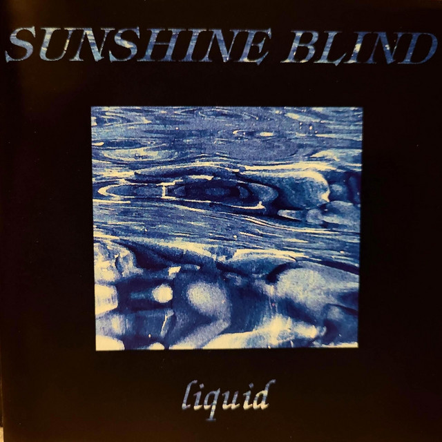 Liquid album cover