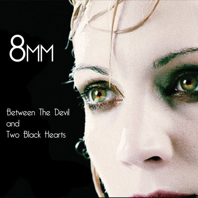 Between the Devil and Two Black Hearts album cover