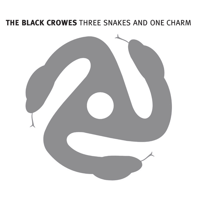 Three Snakes And One Charm album cover