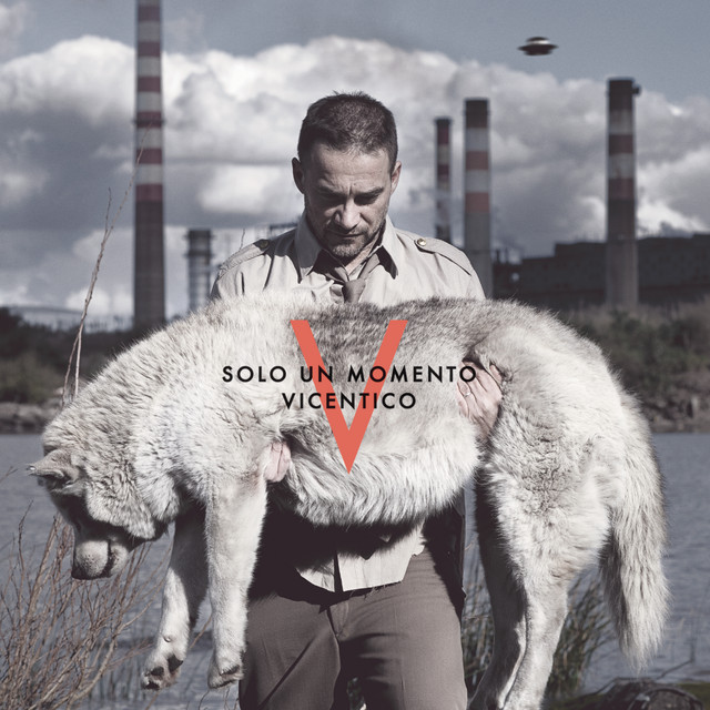 Solo Un Momento album cover