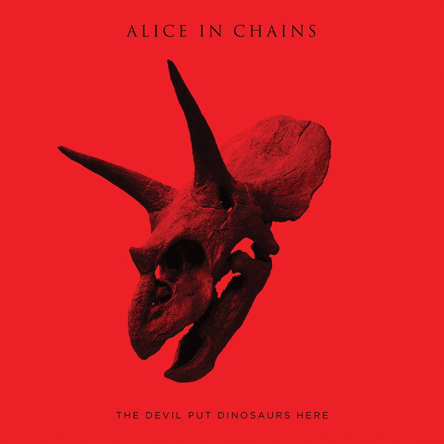 The Devil Put Dinosaurs Here album cover
