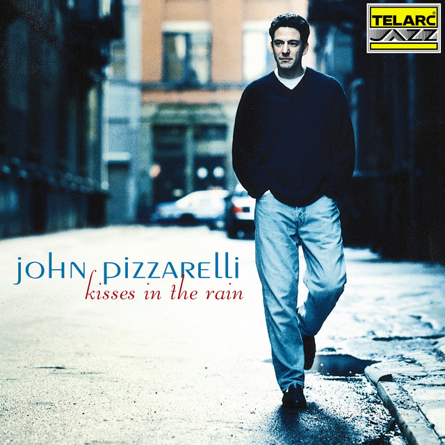 Kisses In The Rain album cover