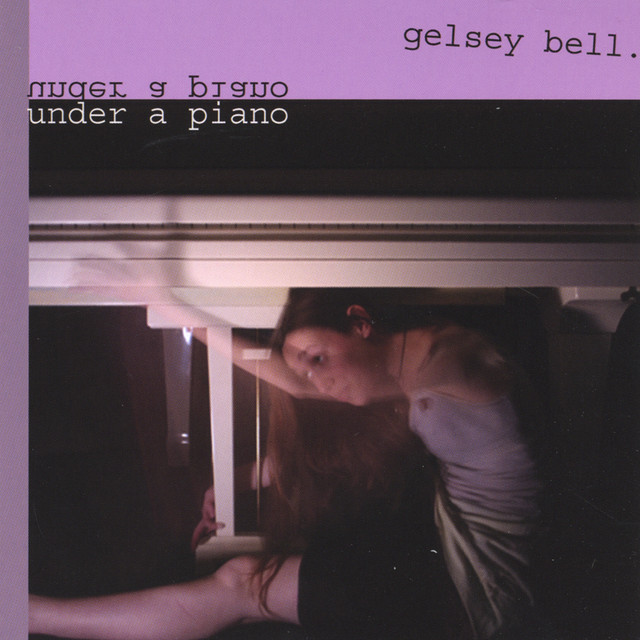 under a piano album cover