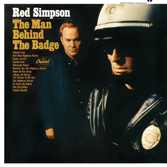 The Man Behind The Badge album cover