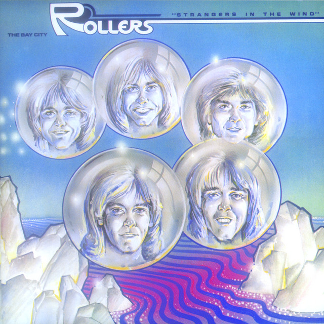 Strangers In The Wind album cover