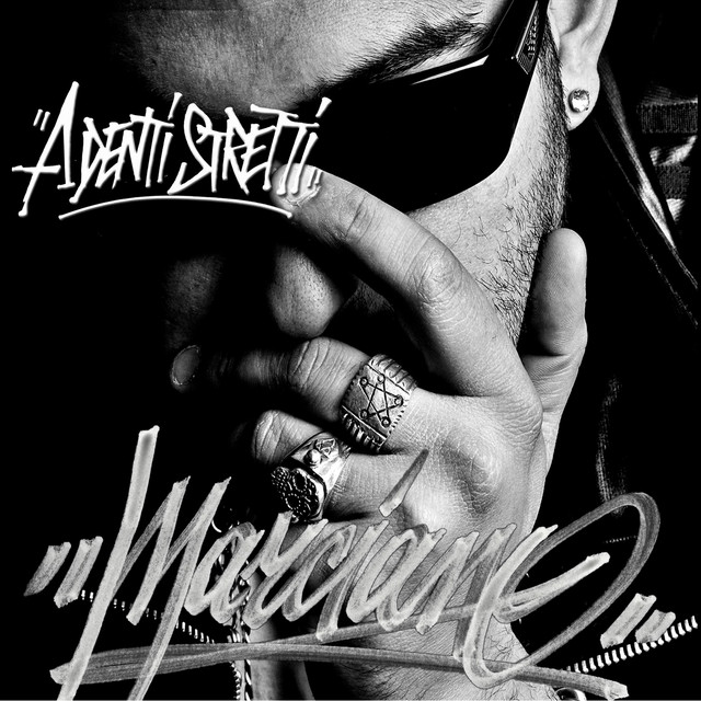 A denti stretti album cover