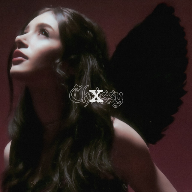 X (VII Deluxe) album cover