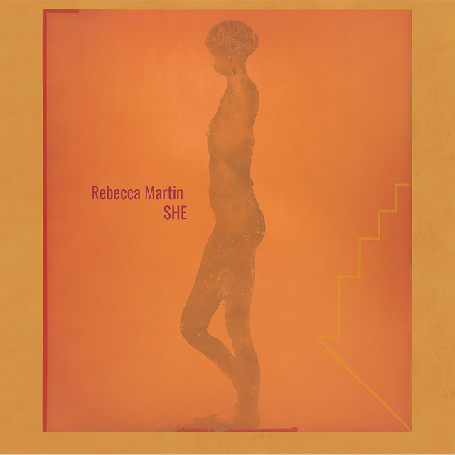 SHE album cover