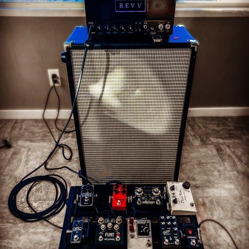 Photo of Fulltone Mini Deja Vibe and more gear in a pedalboard, studio, and guitar