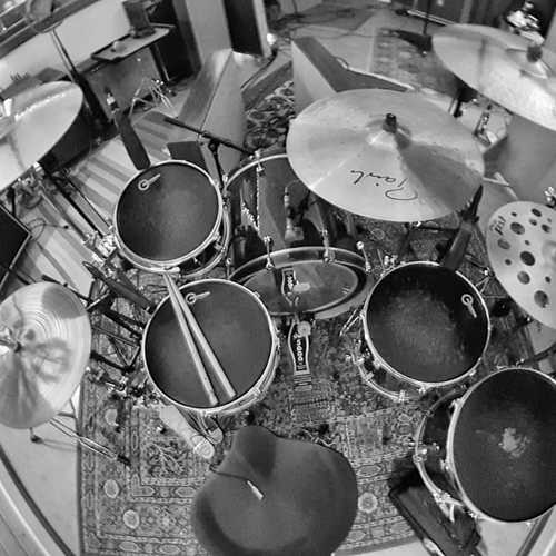 Photo of GMS Drum Kits and more gear in a studio and drums