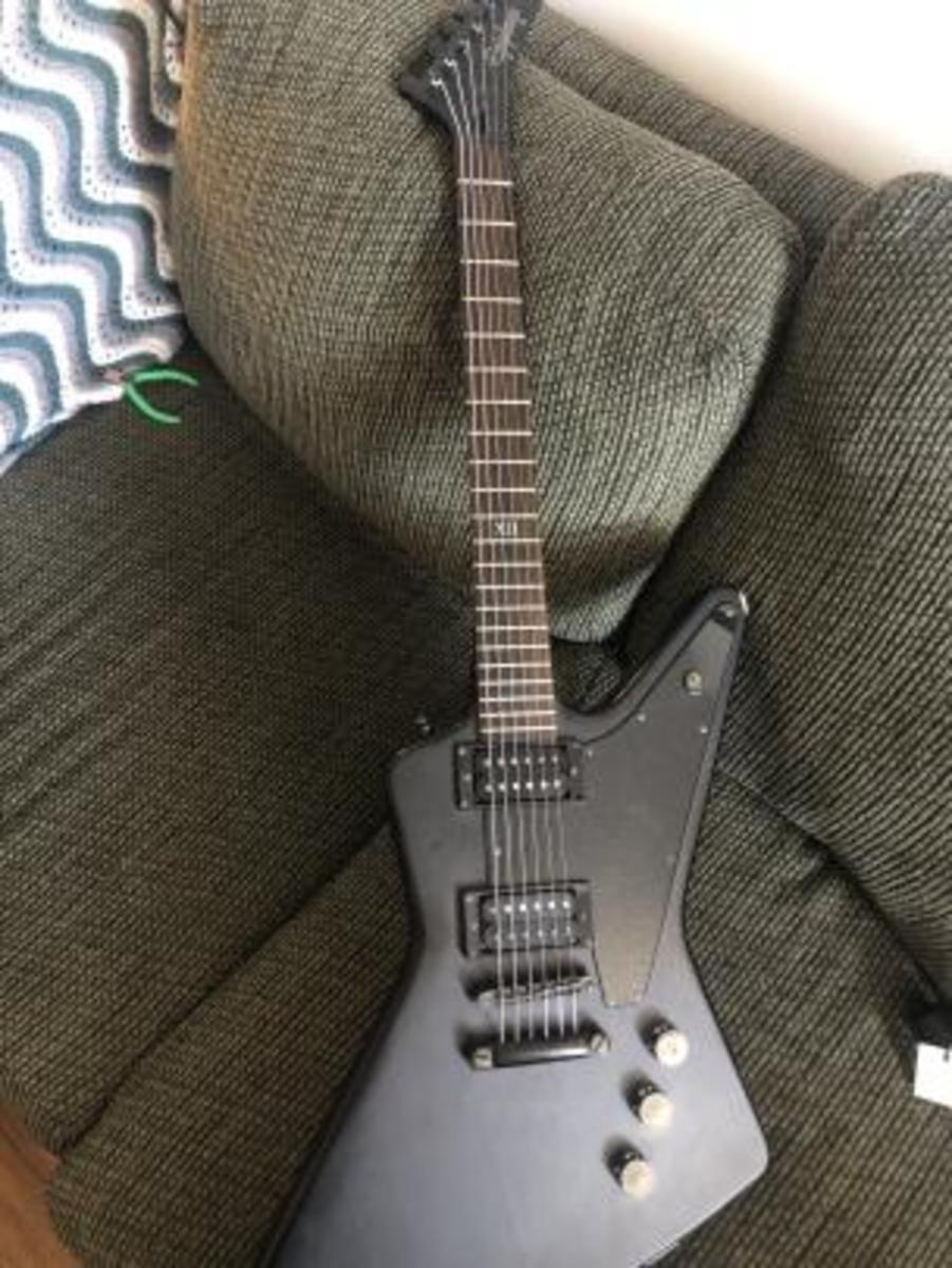 Music Gear Setup by shawntaulicus featuring Epiphone Goth '58 Explorer