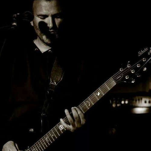 Photo of Schecter UltraCure in a live, guitar, and pedalboard
