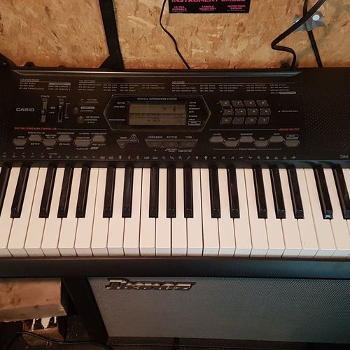 Photo of Casio CTK-3000 in a studio and synths
