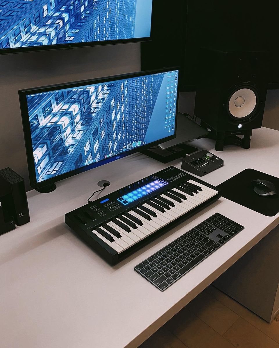 Electronic Studio Setup by travellback featuring Novation Launchkey 37 MK3, Universal Audio Arrow, and Apple Magic Keyboard with Numeric Keypad (Space Grey) and 6 more pieces of gear