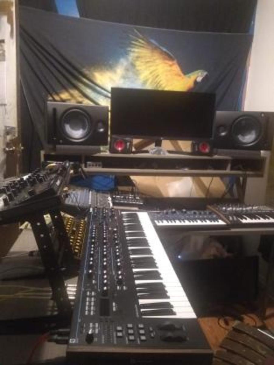 Electronic Studio Setup by junkie_bass_studios featuring Novation Mininova, Novation Summit, and Numark NVII DJ Controller and 5 more pieces of gear