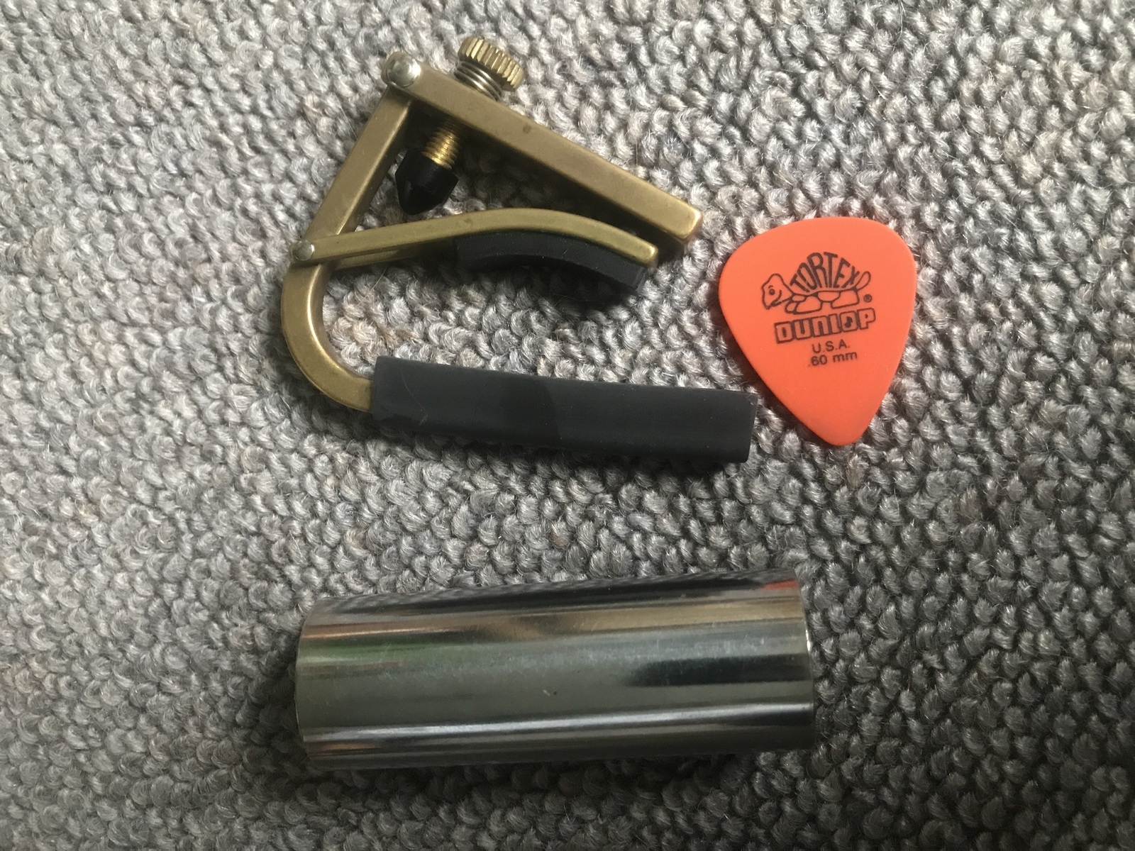 Music Gear Setup by marvinated_mia featuring Fender Steel Slide, Dunlop Tortex Standard 0.60mm Guitar Picks, and Schubb Bronze Steel String Guitar Capo
