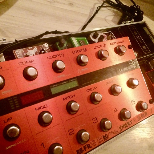 Photo of TC Electronic G-System Limited and more gear in a pedalboard