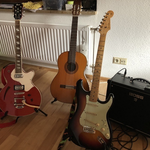 Photo of Cort Sunset 1 and more gear in a studio and guitar