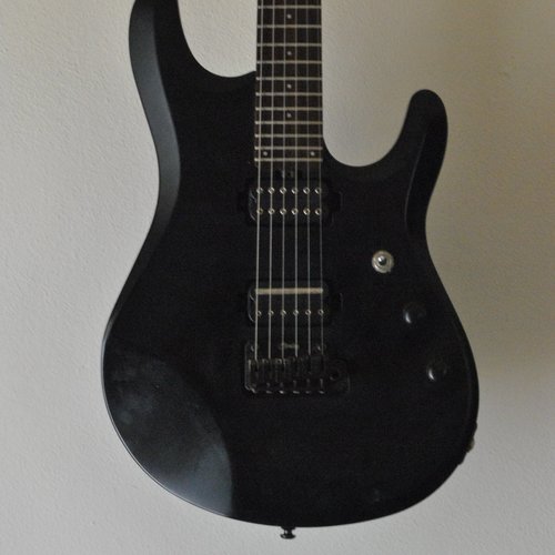 Photo of Sterling by Music Man JP50 in a guitar