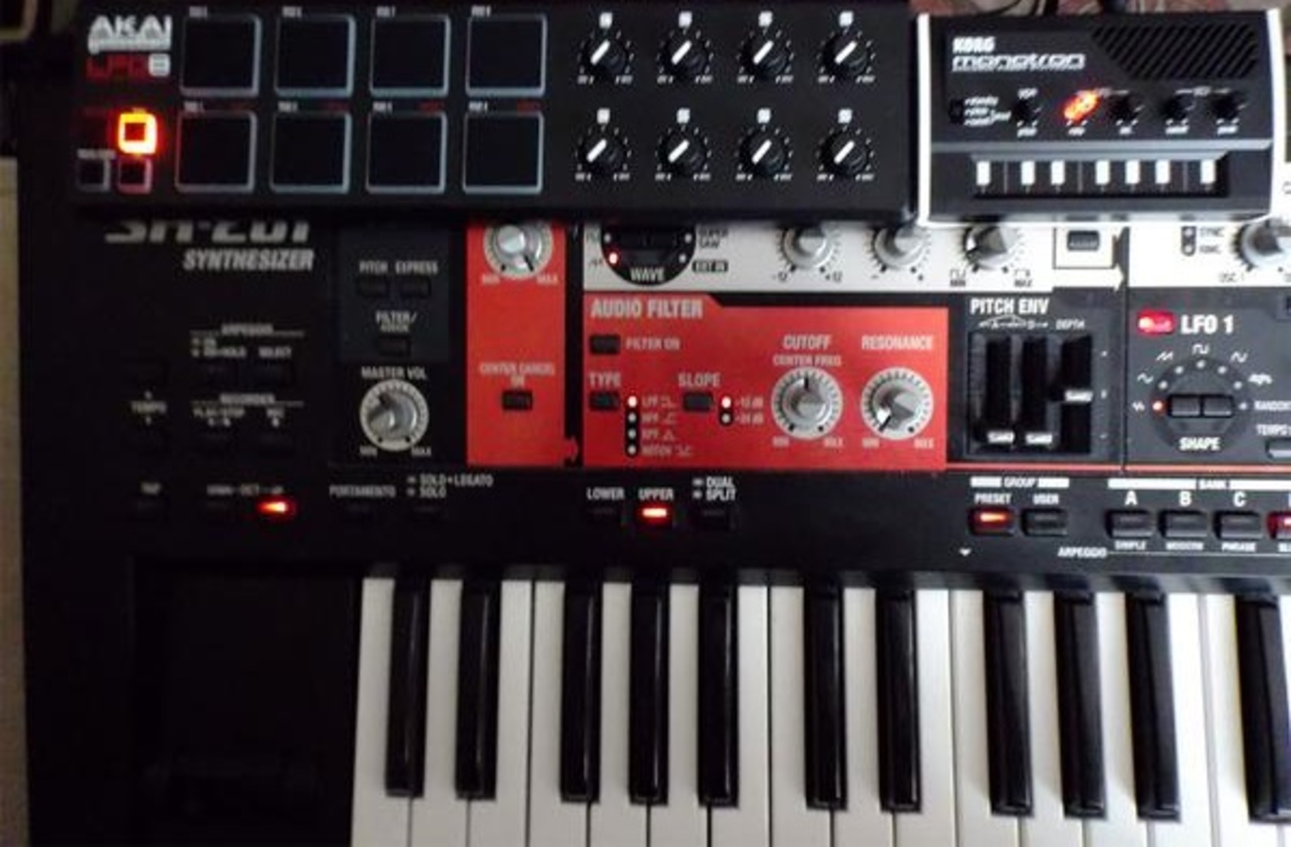 Electronic Synth Setup by ryunocore featuring Korg Monotron Analog Ribbon Synthesizer, Akai Professional LPD8 Laptop Pad Controller, and Roland SH-201 Synthesizer