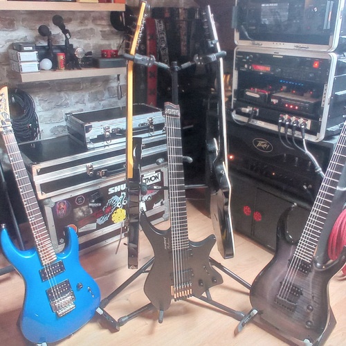 Photo of Ibanez Iceman ICT700 and more gear in a guitar and amplifier