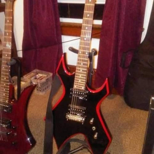 Photo of B.C. Rich Warlock Widow and more gear in a guitar