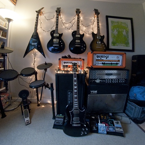 Photo of LTD EC-400AT and more gear in a pedalboard, guitar, and amplifier
