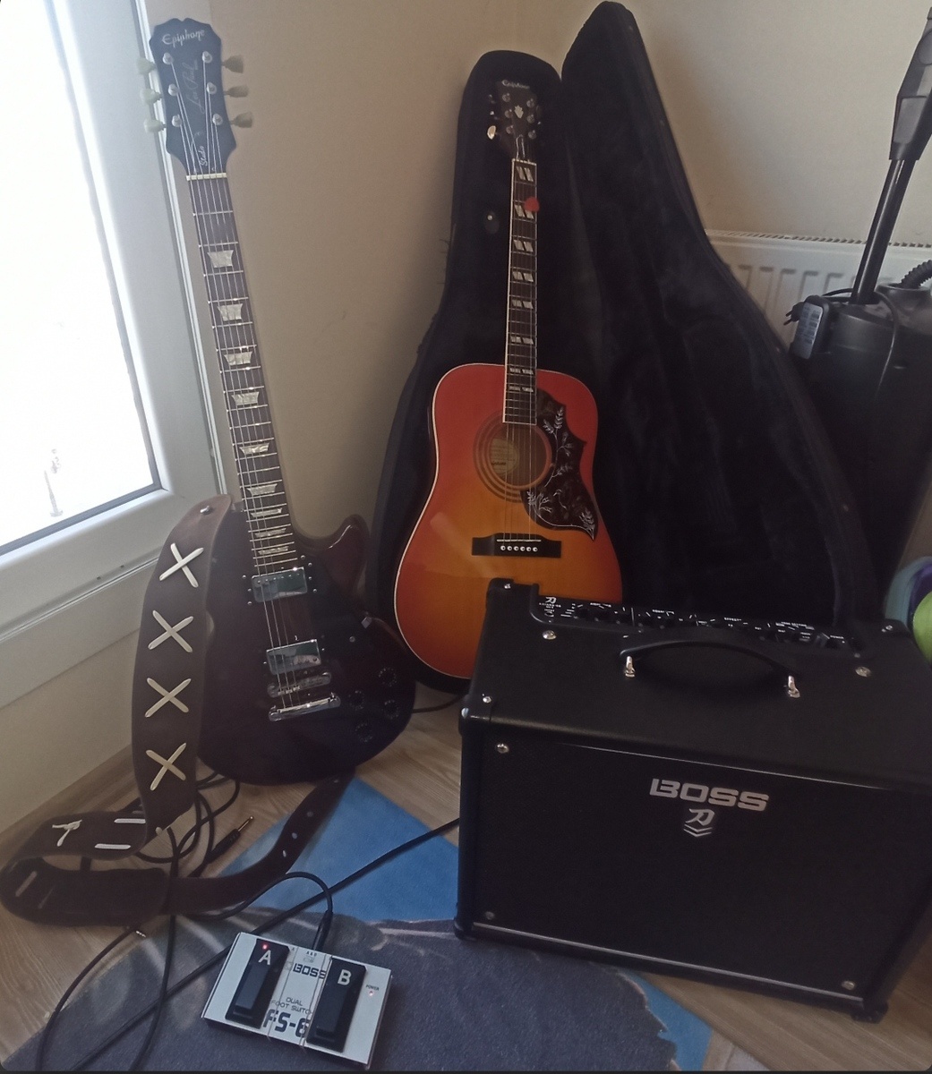 Boss Pedalboard by hakanbaysal featuring Boss Katana 50 MKII, Epiphone Limited Edition Les Paul Studio Deluxe Electric Guitar, and Epiphone Modern Collection Hummingbird PRO and 2 more pieces of gear