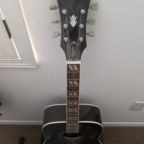 Photo of Epiphone Hummingbird Artist in a guitar