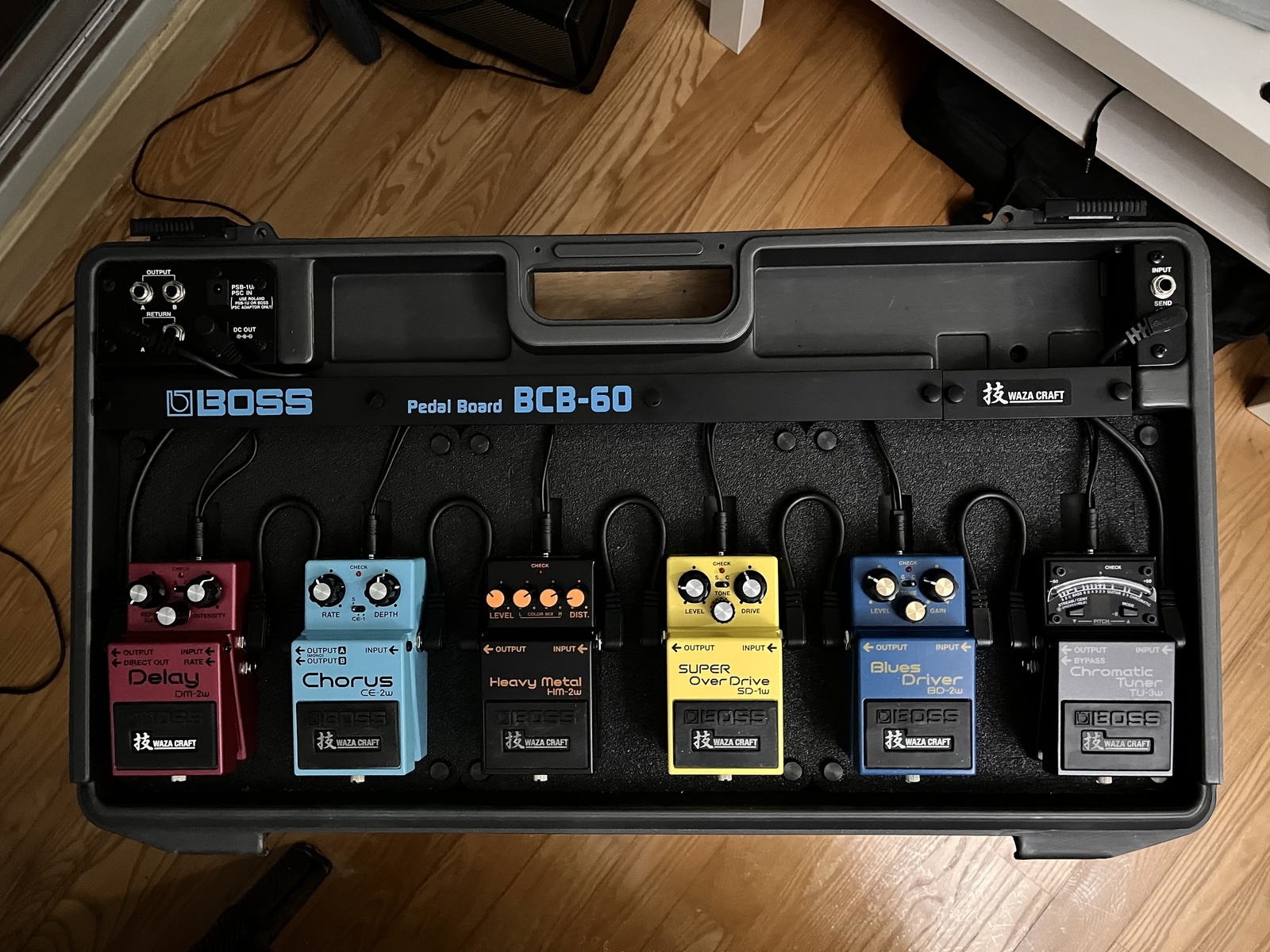Pedalboard by thitipan featuring Boss TU-3W Chromatic Tuner, Boss SD-1W Super OverDrive, and Boss BD-2W Blues Driver Waza Craft and 3 more pieces of gear