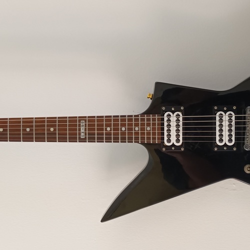 Photo of LTD EX-50 in a studio, guitar, and closeup
