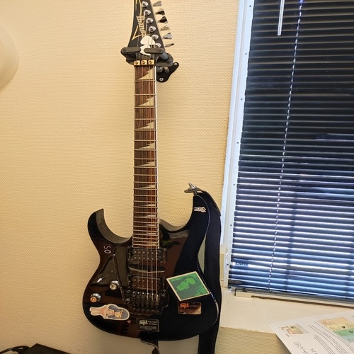Photo of Ibanez RG 370 DXL in a studio and guitar
