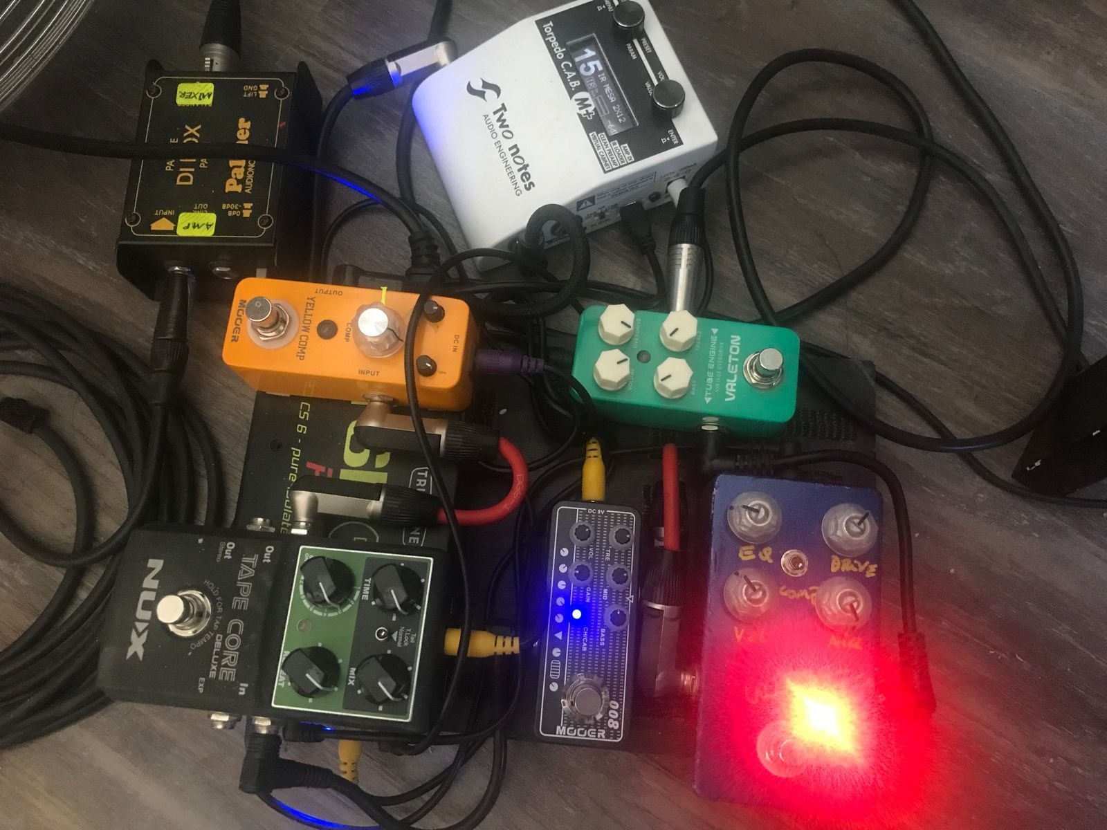 Metal Pedalboard by cristian_aroca featuring Mooer Yellow Comp, Mooer Micro Preamp 008 Cali-MK 3, and Two Notes Torpedo C.A.B. M and 2 more pieces of gear