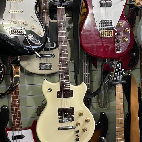 Photo of Roland G 202 and more gear in a guitar