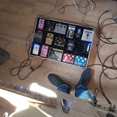Photo of Cluster Jaminabox Overdrive and more gear in a pedalboard and guitar