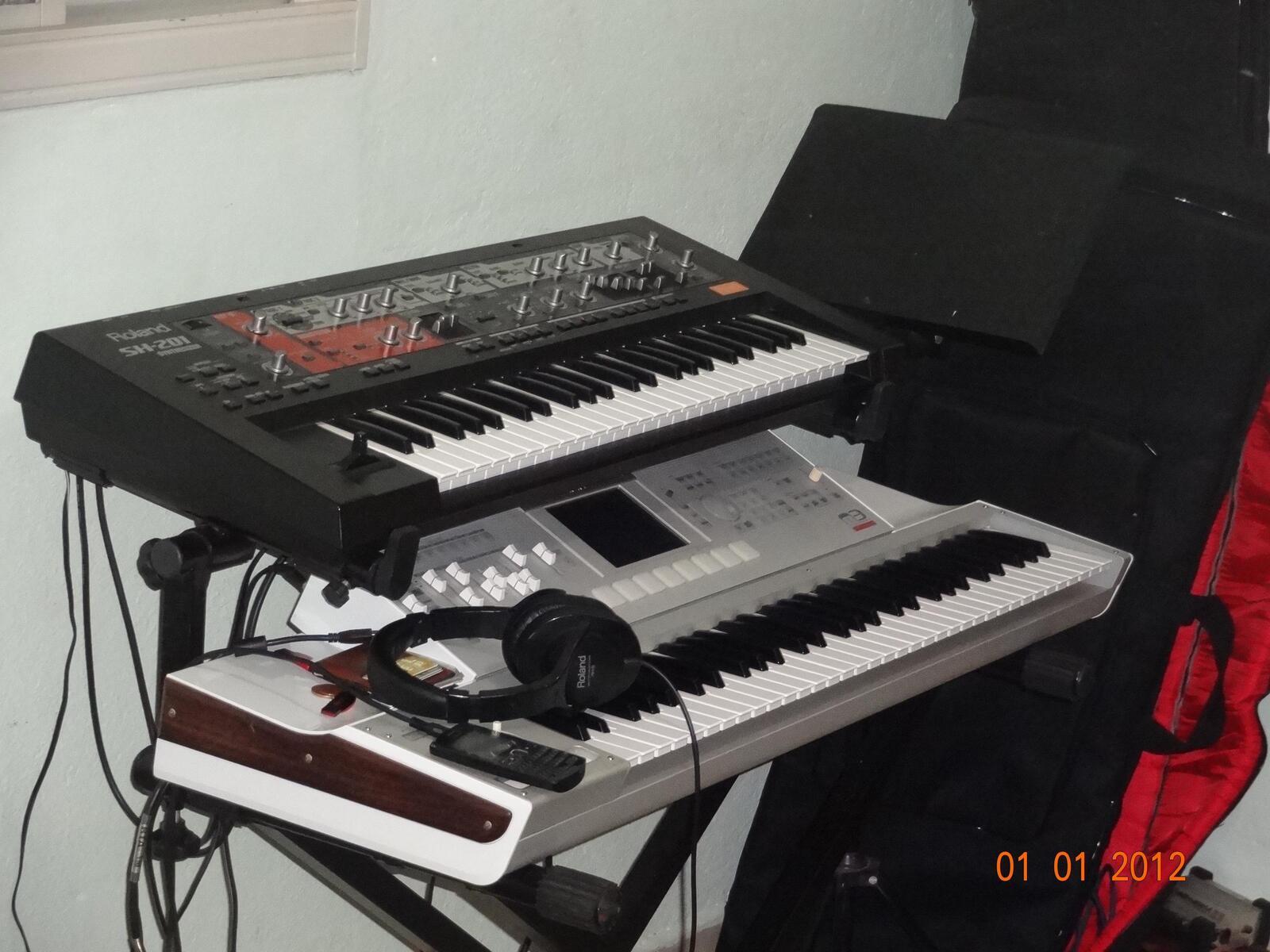 Roland Live Rig by joao_paulo_melo_silva featuring Korg M3 61-Key Music Workstation Keyboard, Roland SH-201 Synthesizer, and IBOX BX2 and 1 more piece of gear