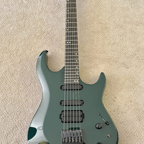 Photo of Kiesel Osiris OS6X in a guitar