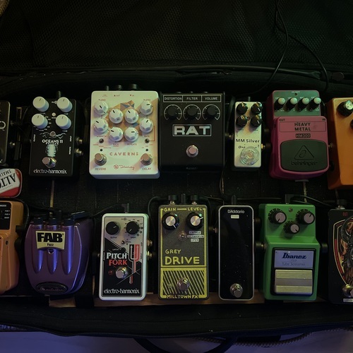 Photo of Keeley Caverns V2 and more gear in a pedalboard