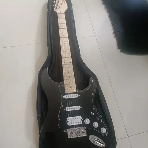 Photo of JCraft S-1H HSS Stratocaster in a guitar