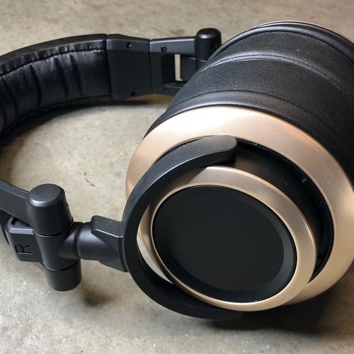 Photo of Status SM-CB1 Headphones in a studio and closeup