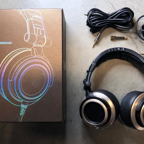 Photo of Status SM-CB1 Headphones in a studio and closeup