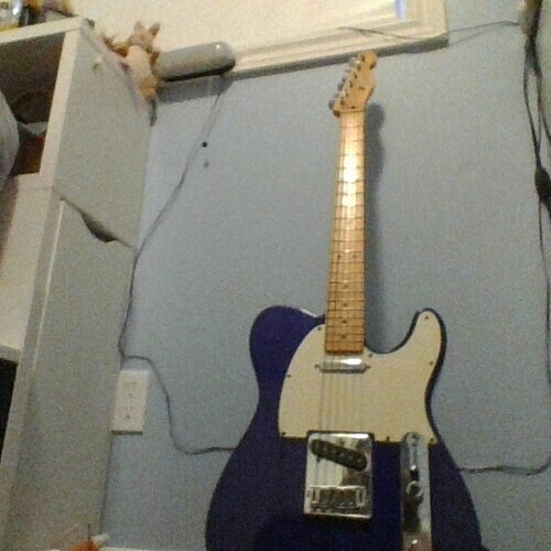 Photo of Fender 2000 MIM Telecaster in a guitar