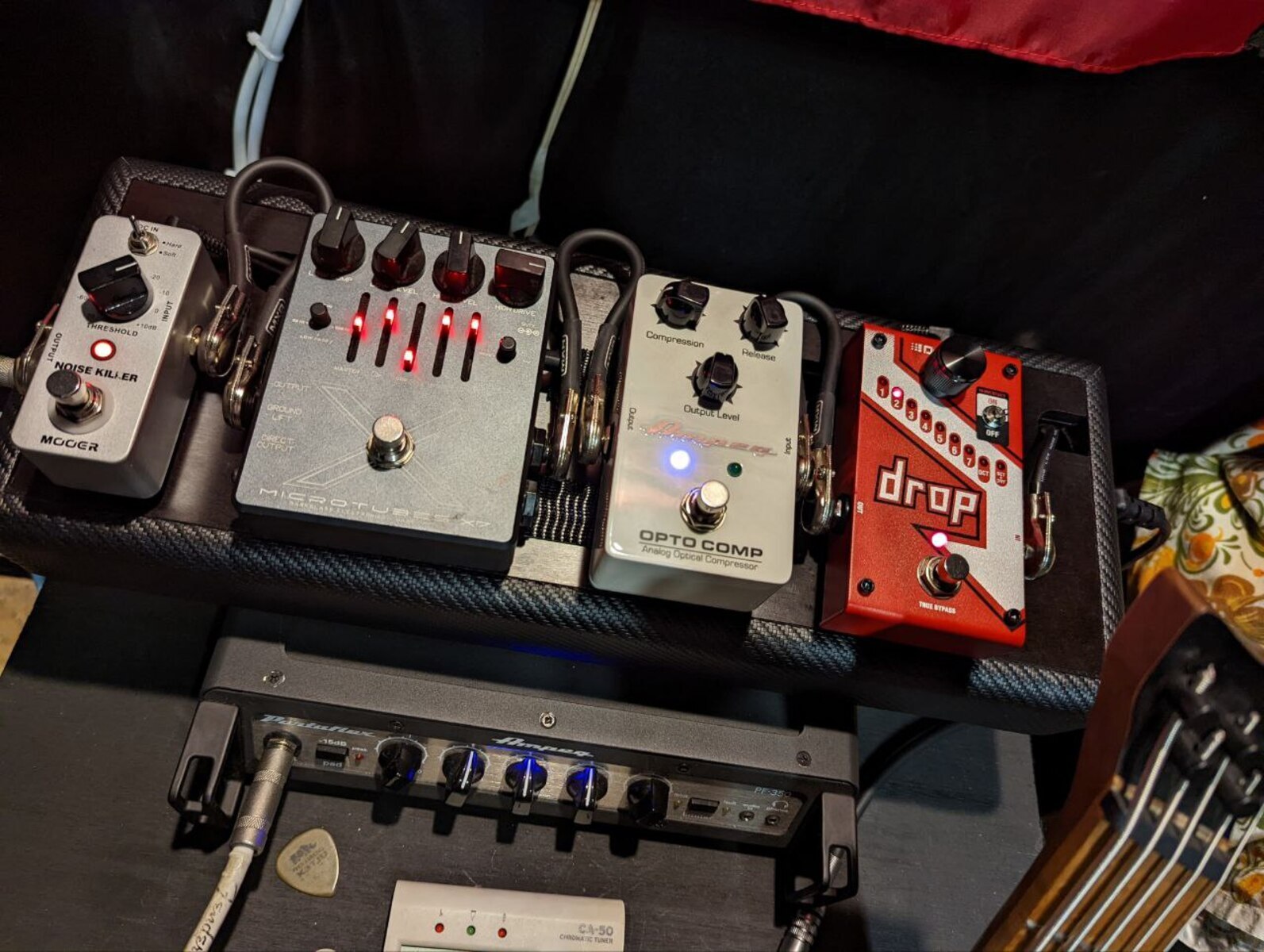 Metal Pedalboard by cozvtieg9 featuring Mooer Noise Killer, Ampeg Opto Comp, and DigiTech Drop and 2 more pieces of gear