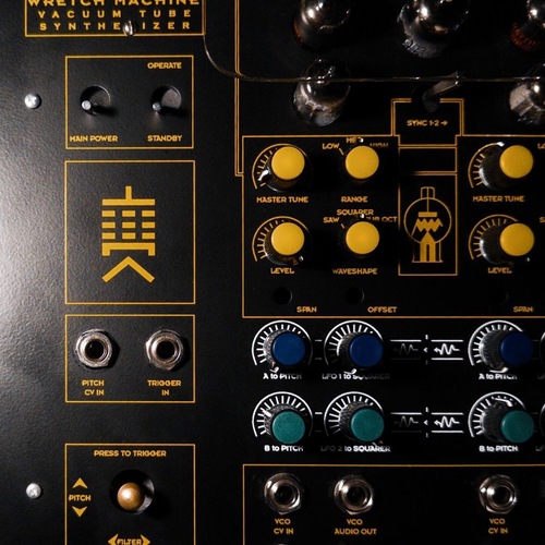 Photo of Metasonix S-1000 Wretch Machine in a studio and synths