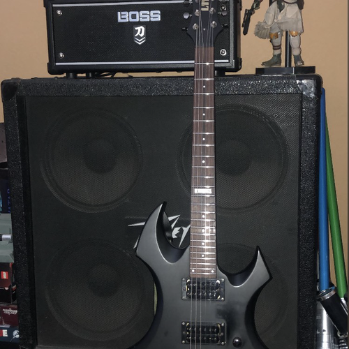 Photo of ESP LTD AX-50 and more gear in a guitar and amplifier