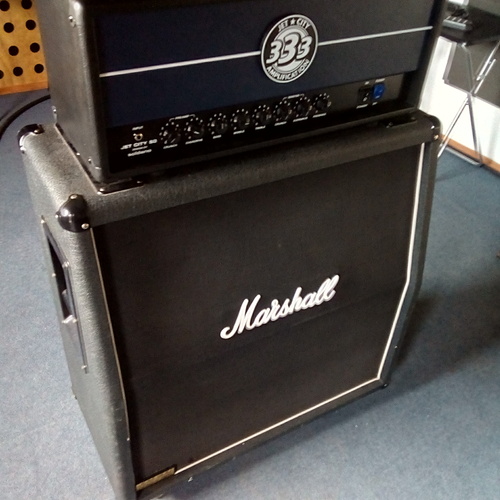 Photo of Jet City JCA50H and more gear in a studio, guitar, and live